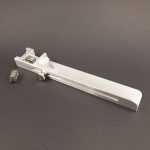 Left handed composing stick